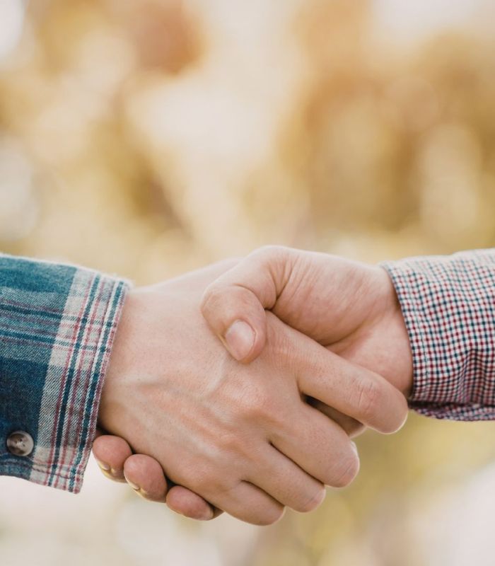Pinnacle Climate Systems team in front of service trucks
